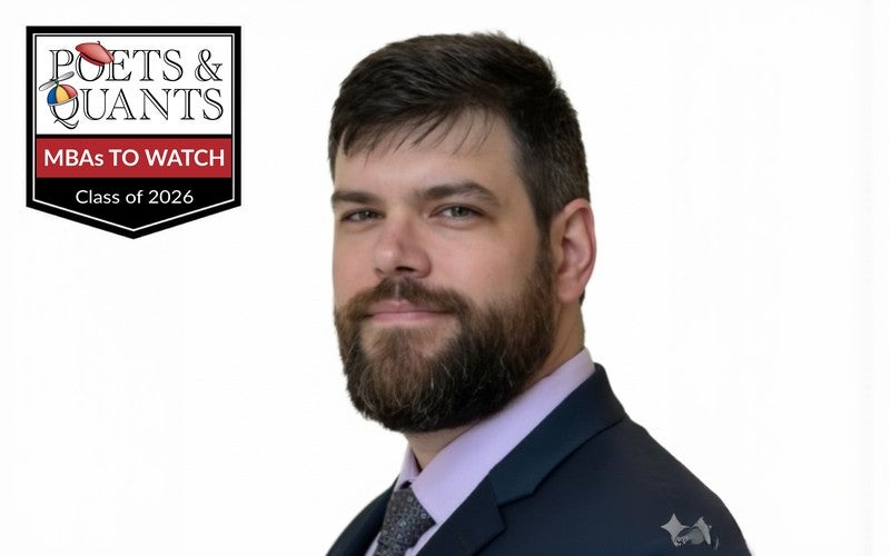 Seldon Warner, wearing a suit and tie, beside a Poets&Quants “MBAs to Watch, Class of 2026” badge.