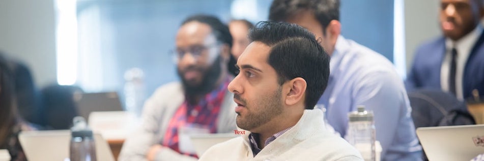 image of students learning in a classroom