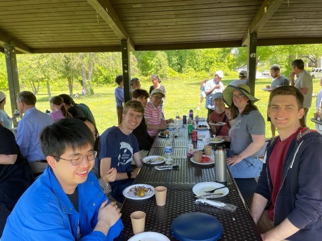 students gather at a social picnic