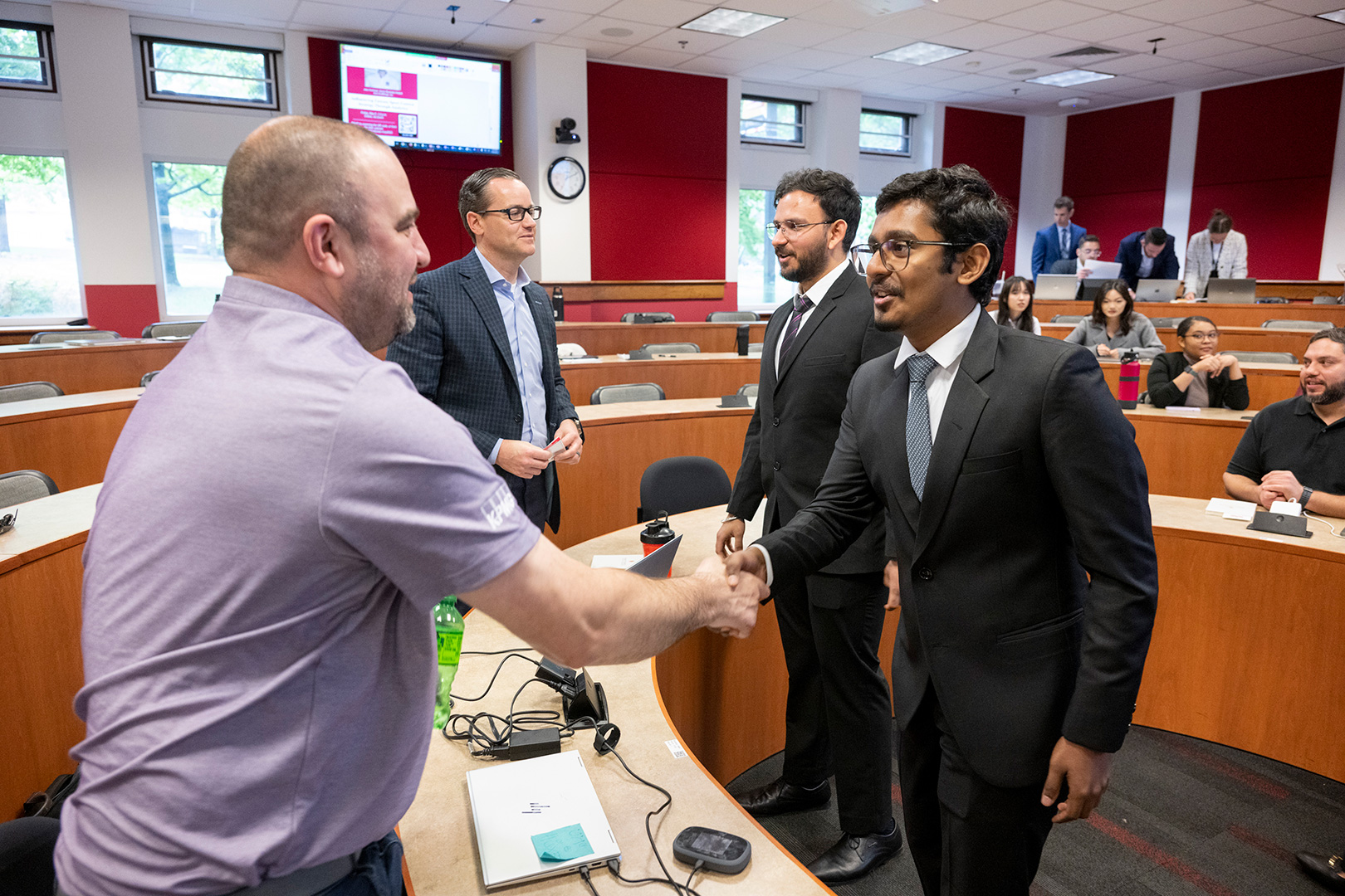 Student participants had the opportunity to network with Deloitte and KPMG judges during the Datathon finale. 